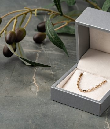 Small jewelry box on gray background close up